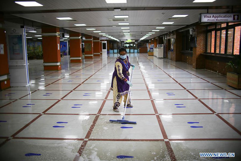 Staff Sanitizing the Airport , TIA, Kathmandu, Nepal