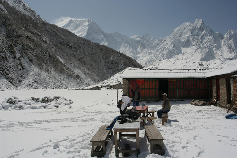Snowy landscapes and a cozy tea house along the Manaslu Circuit Trek