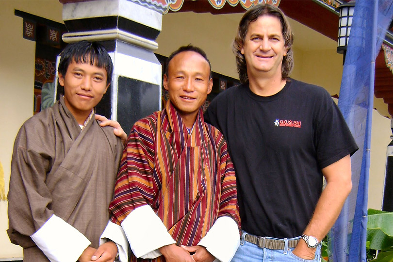 Socializing with the local people in Bhutan; one of the reasons you need tour guide in Bhutan