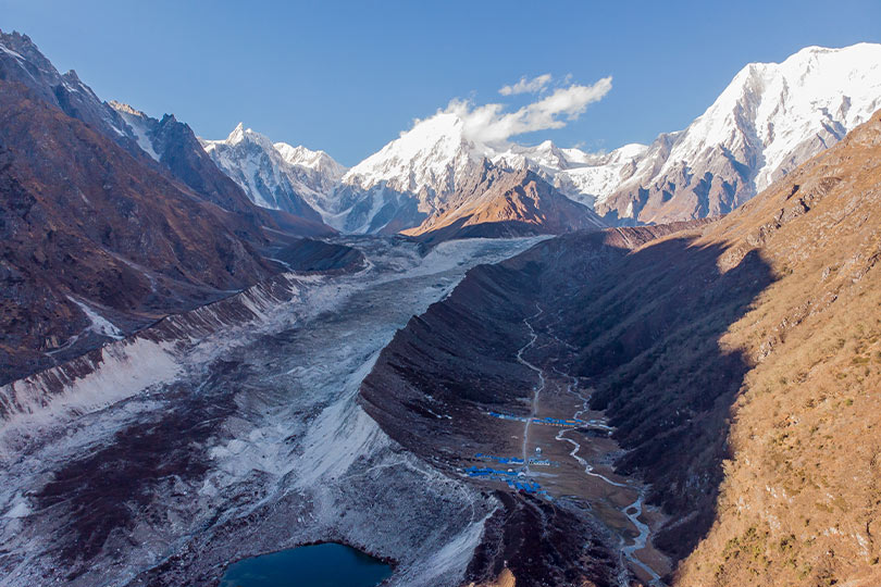 Beautiful view of the Glacier, Village and Manaslu Massif taken via drone