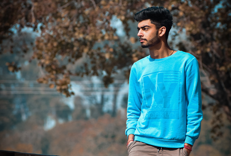 Traveler wearing long sleeved wears during his evening stroll, steps to prevent dengue fever/mosquito bite