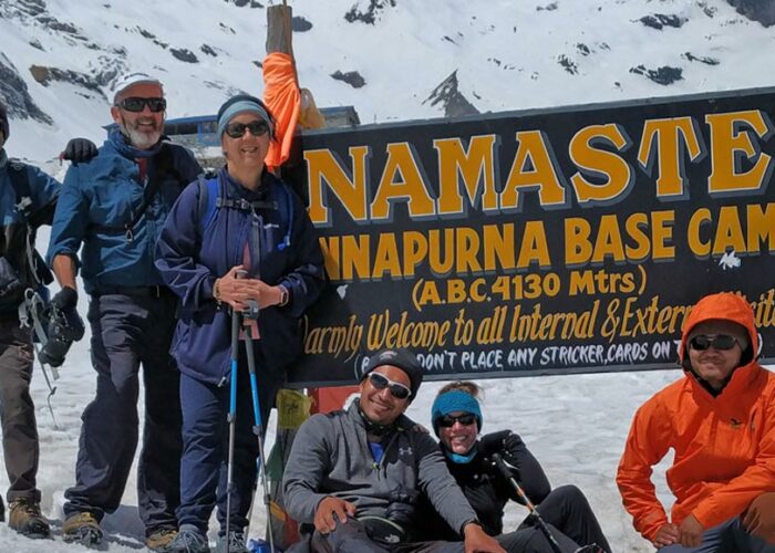 Clients at Annapurna Base Camp after completing the trek with elevation gain