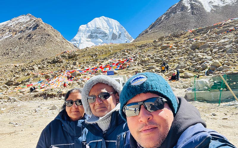 Taking selfie with guest with mount kailash on background