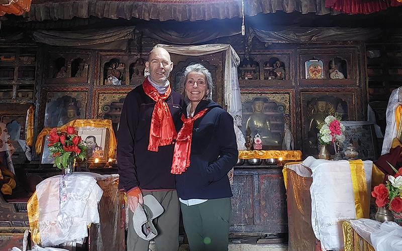 Guest taking picture at local monastery during tsum valley trek